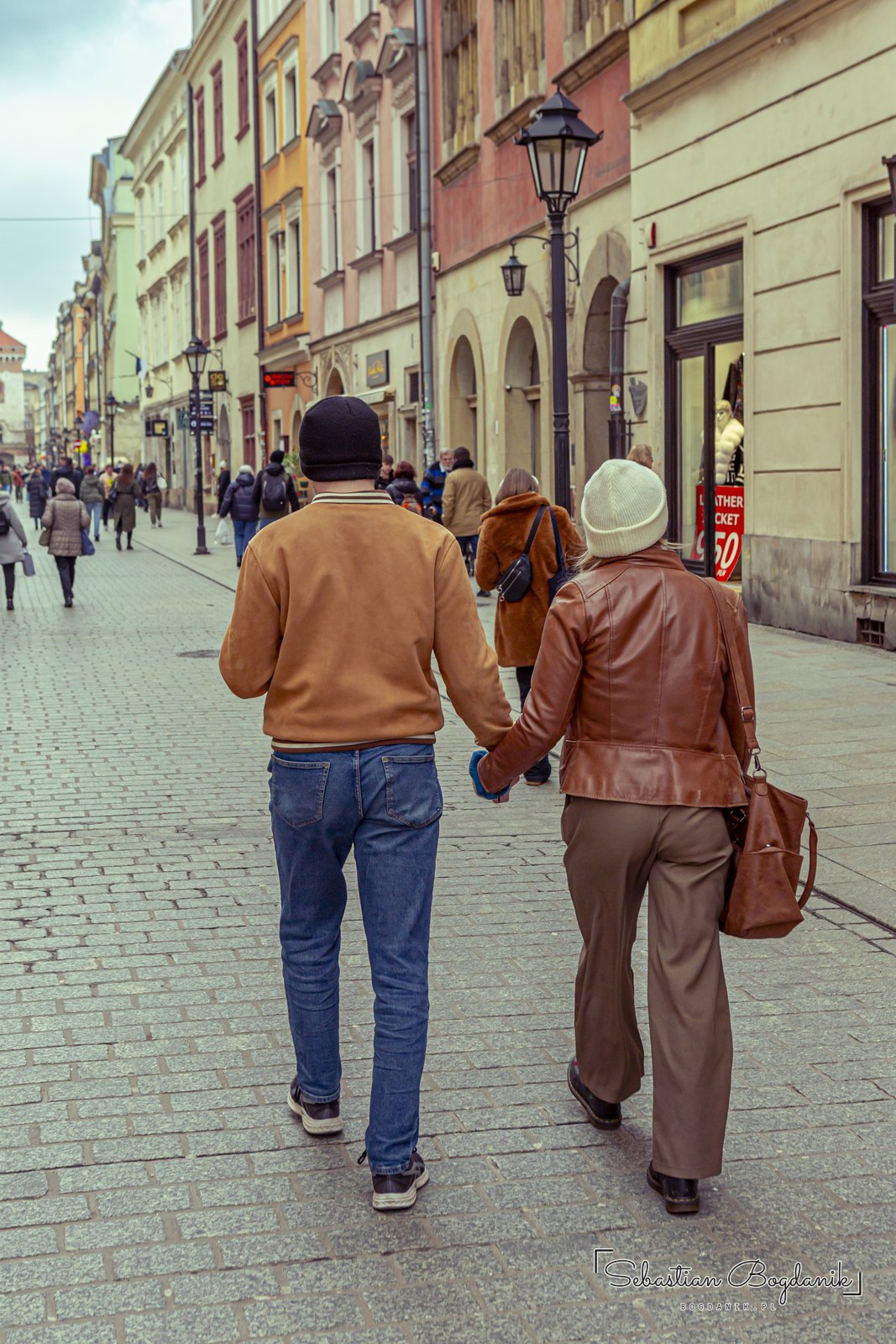 Down Floriańska, hand in hand.