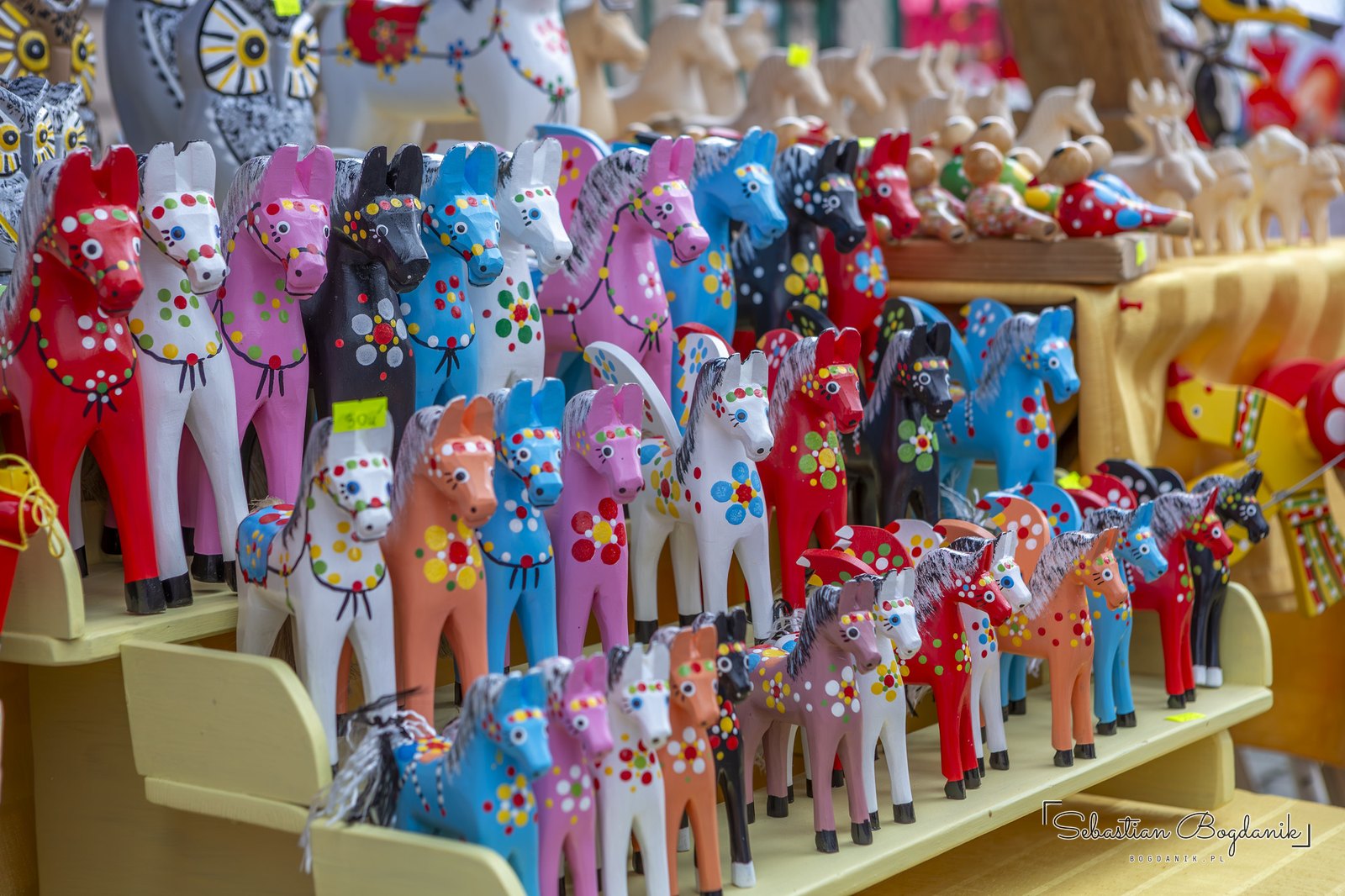 A stall full of wooden horses, the theme of this year’s festival.