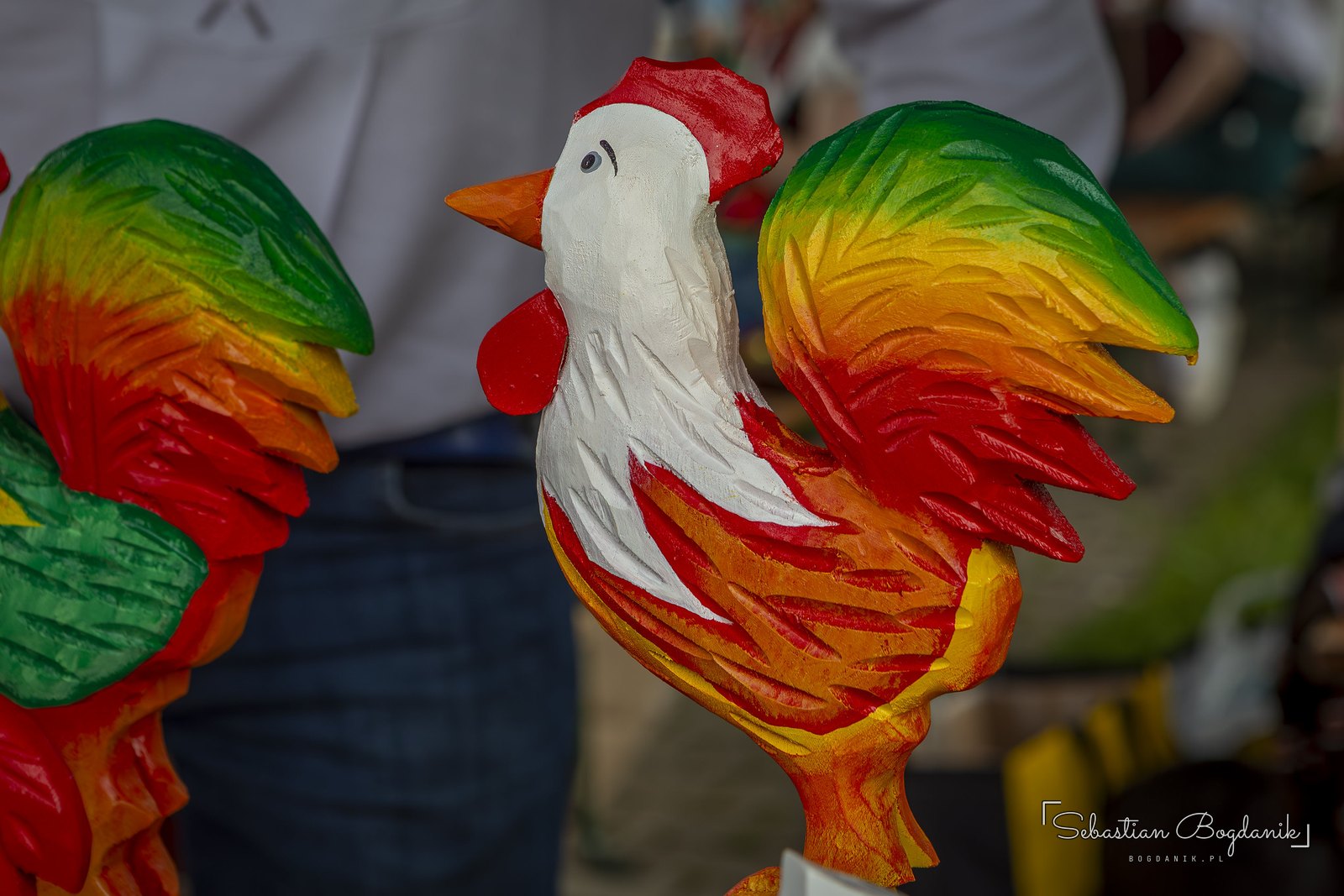 A carved rooster in full colour.