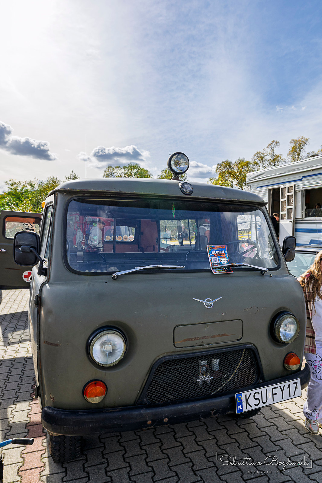 A UAZ-452 ambulance with a red cross on the door (1/2)
