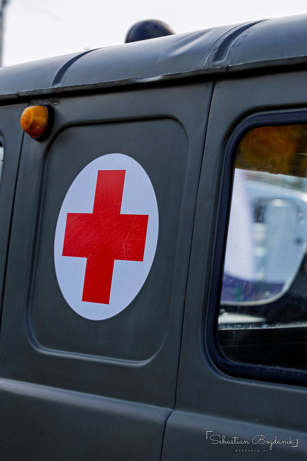 A UAZ-452 ambulance with a red cross on the door (2/2)
