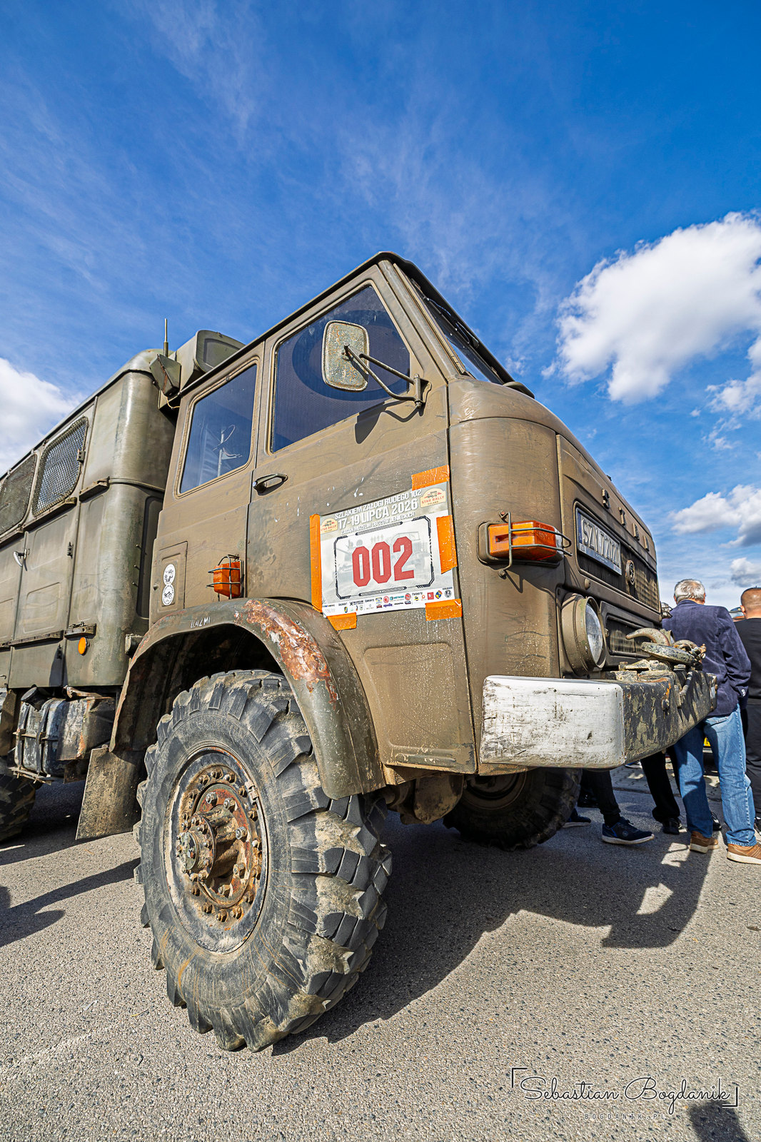 Stars from Starachowice: a red Star dump truck and a military Star 266 wearing number 002 (2/2)